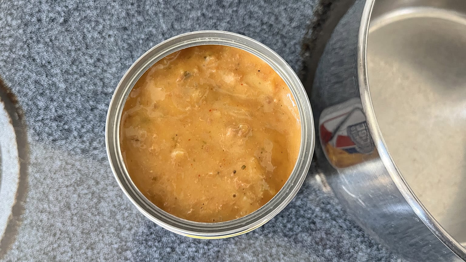 Looking straight down at the open can fulla soup. Lumpy gravy!