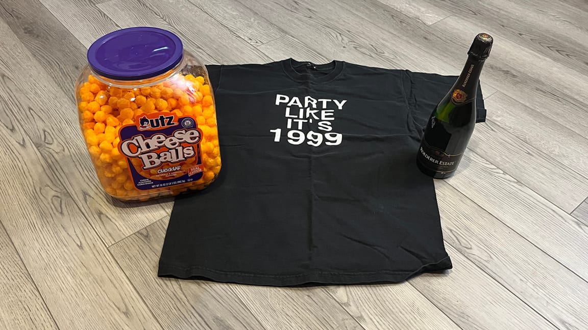My PATY LIKE IT'S 19(9 t-shirt, a bottle of bubbly, and a big thing of UTS CHEESE BALLS. Happy New Year!