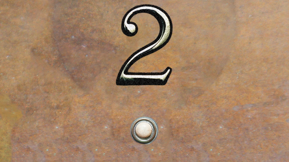 a little round button in the wall by the doorframe, and above it a brass numeral 2