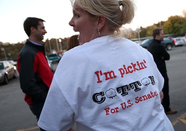 Woman wearing t-shirt reading I'M PICKIN' COTTON FOR U.S. SENATE!